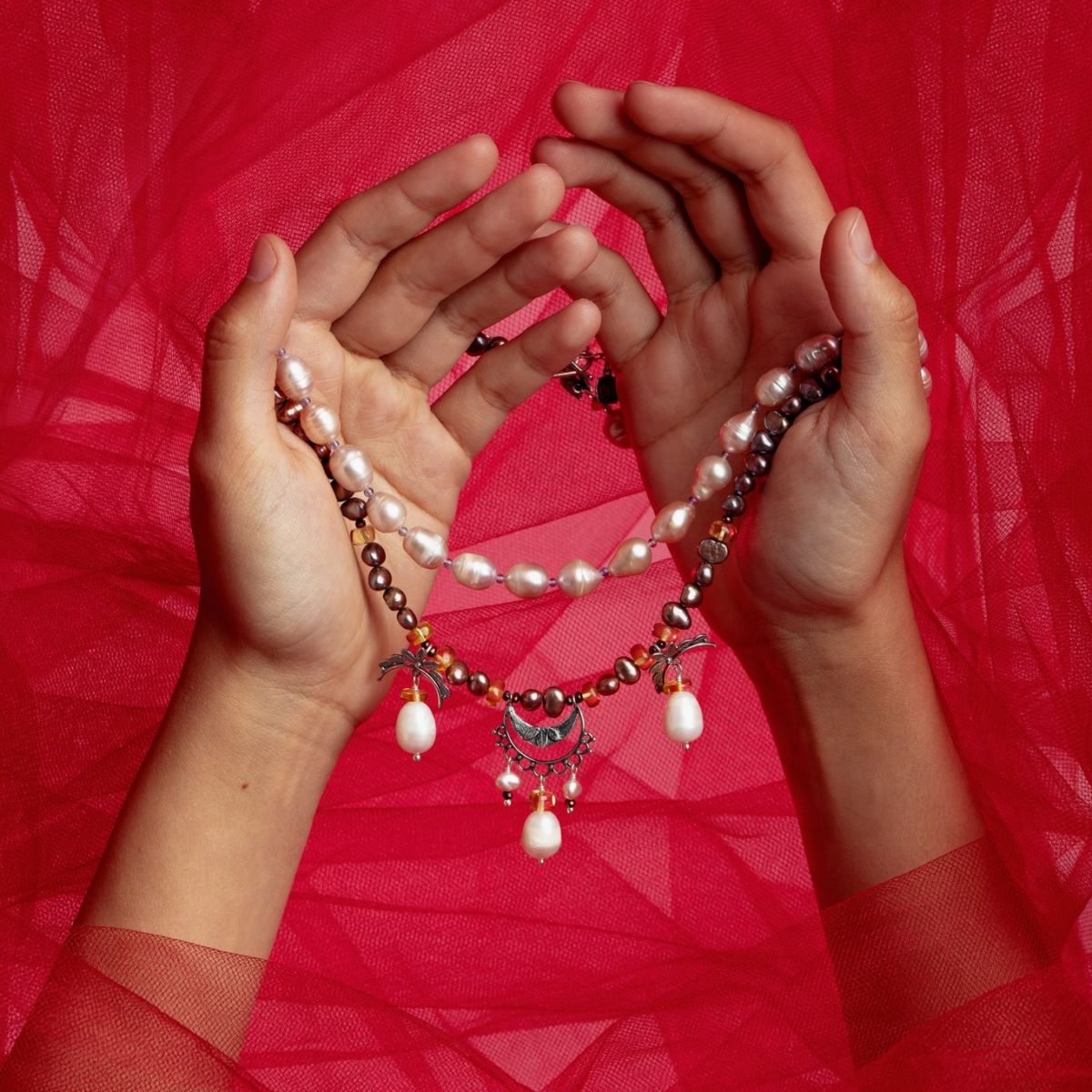statement pieces con perlas
