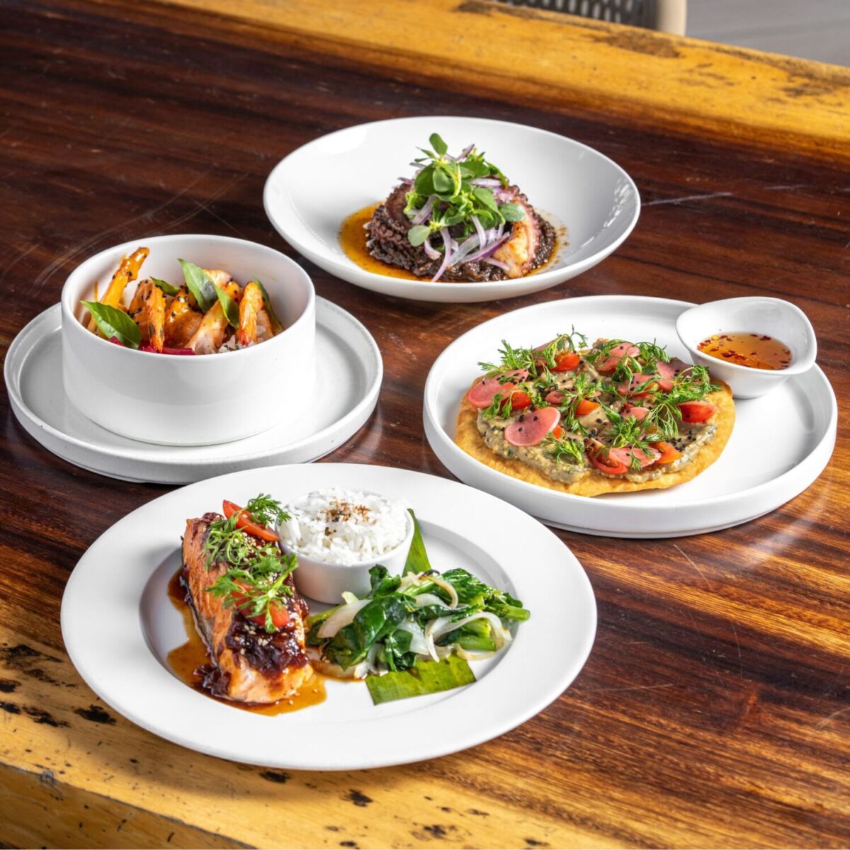 Platos de mariscos servidos en el Hotel Hilton Tulum Riviera Maya 