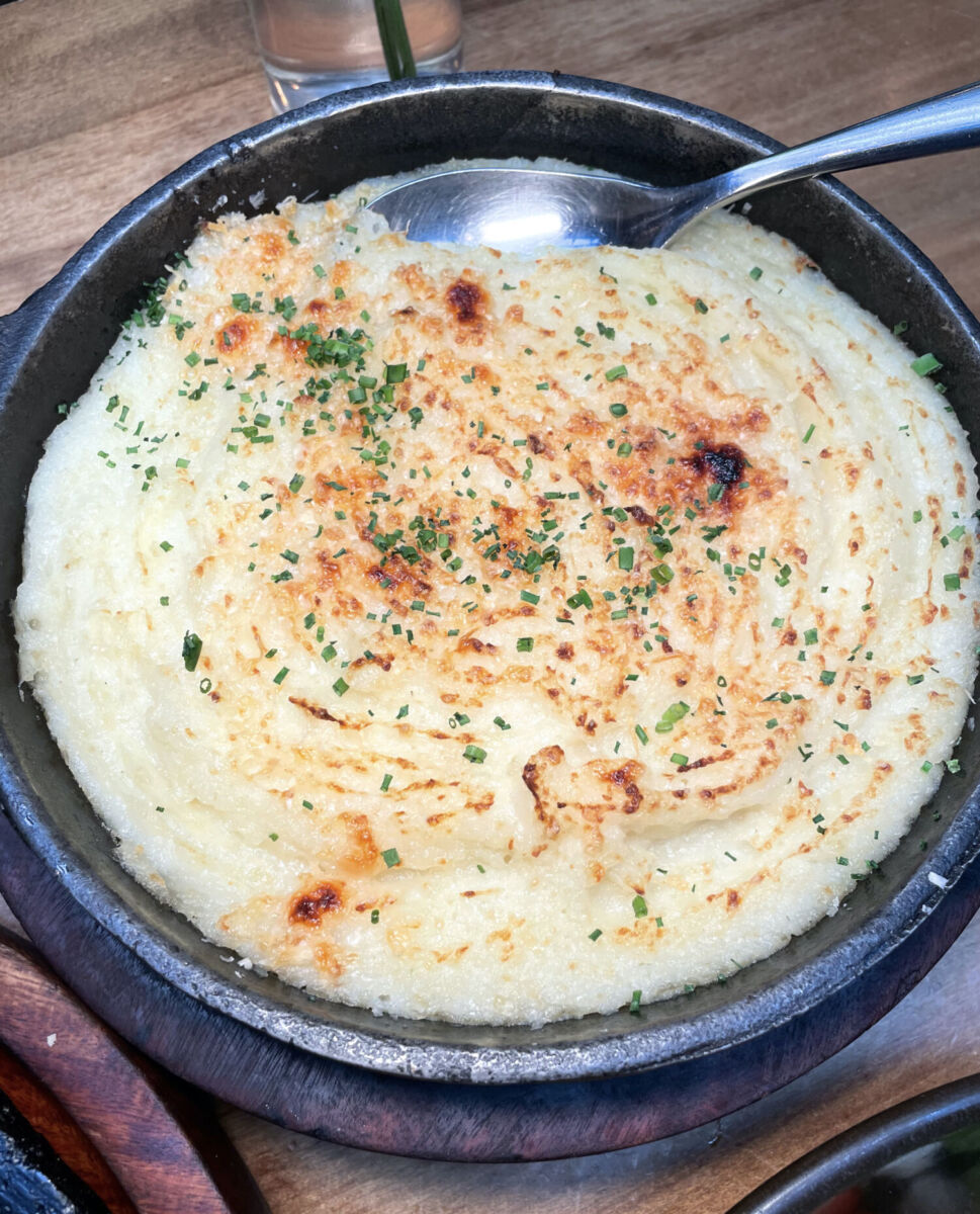 Cremoso puré de papa en el restaurante Dante Brasa y Fuego 