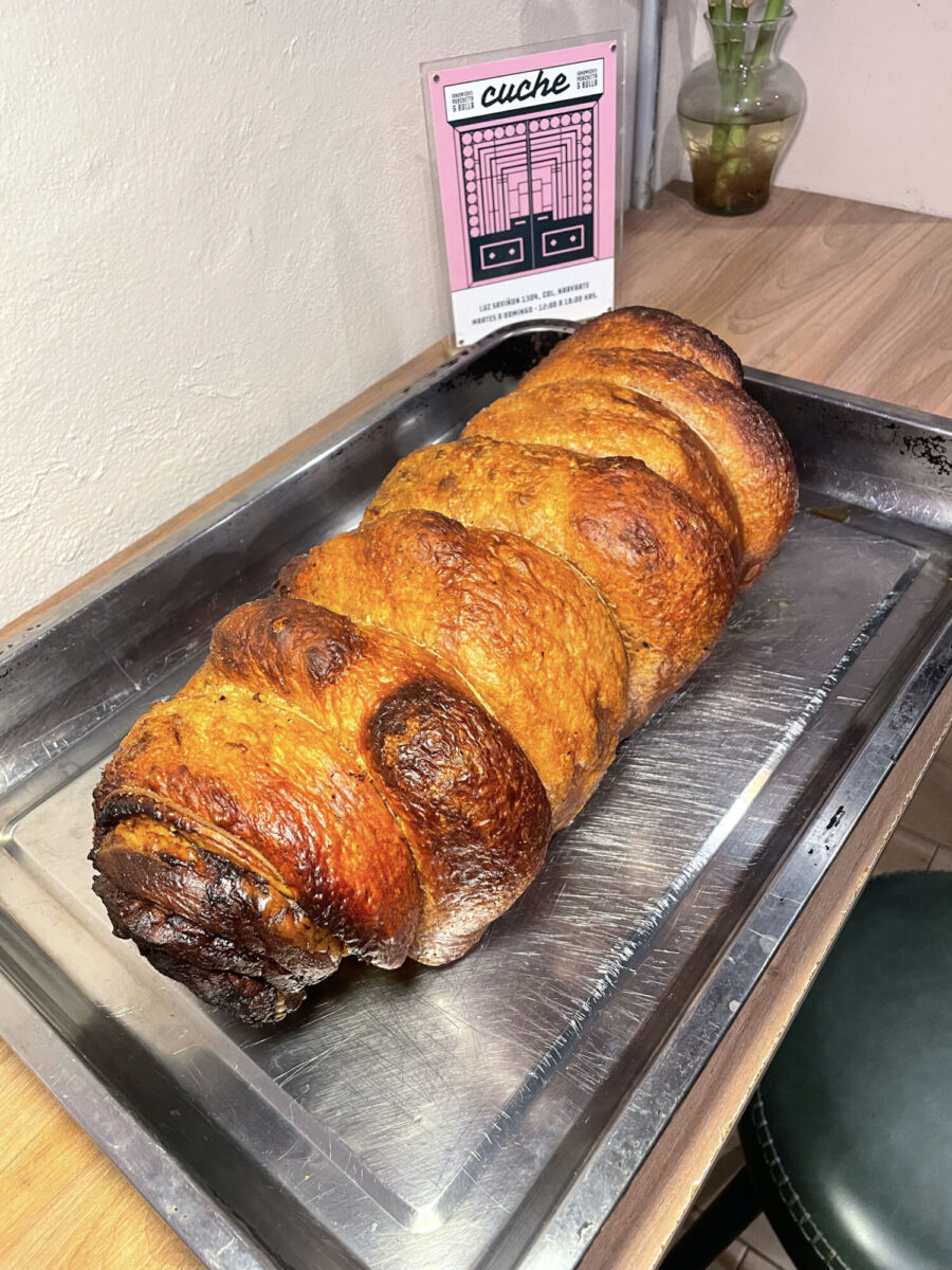 Rollo de porchetta italiana en Cuche Restaurante